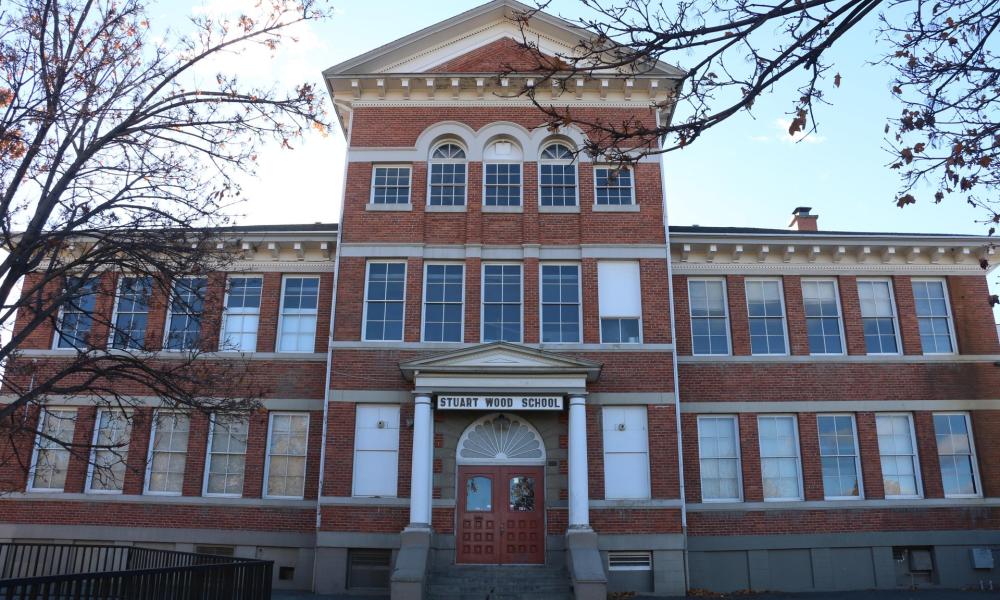 red brick three-story building